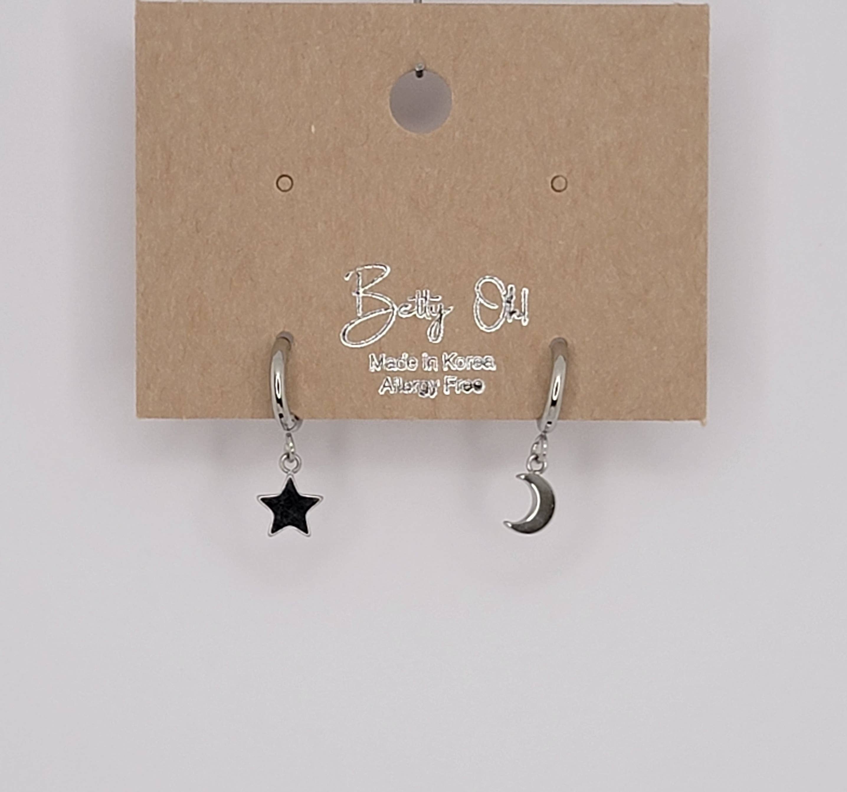 MINI STAR AND MOON HUGGIE HOOP SS EARRINGS.: Silver
