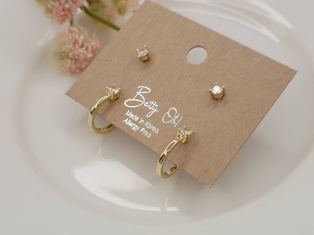 4 PCS SET GOLD PLATED HOOP AND STUD TARNISH FREE EARRINGS.