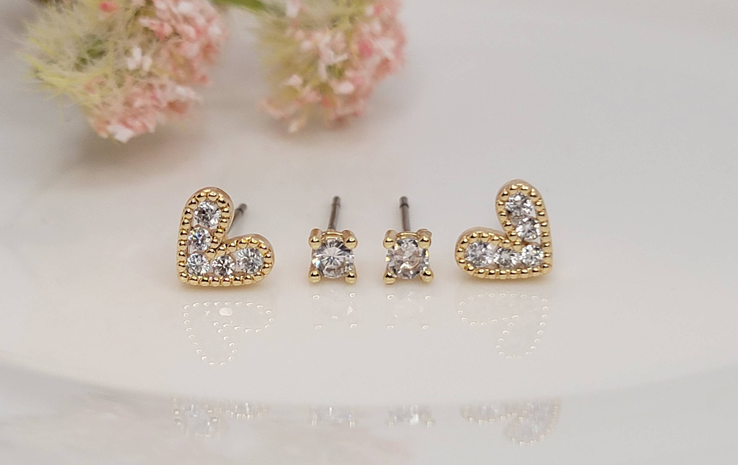 TWO PAIR SET STUD TARNISH FREE EARRINGS.