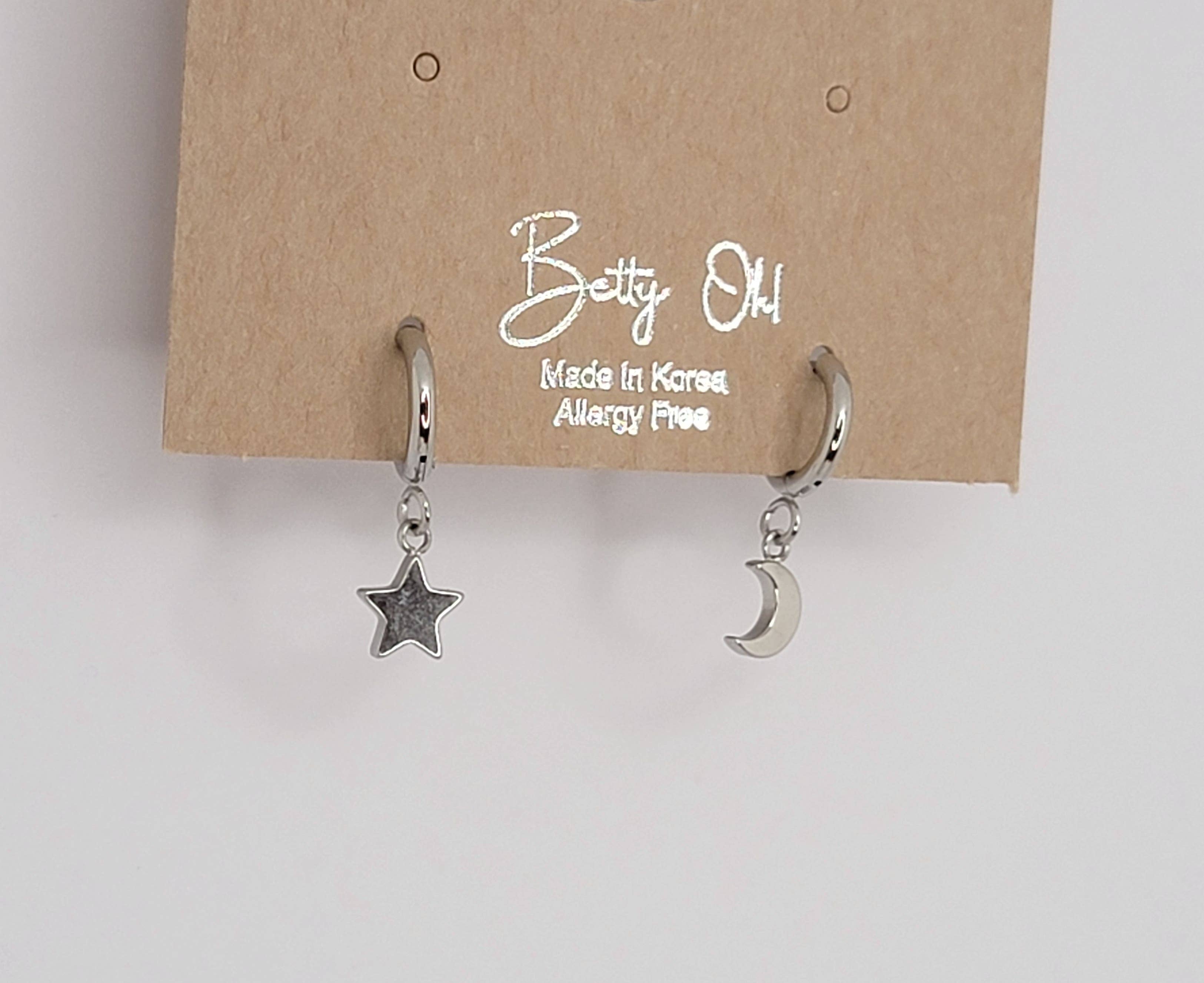 MINI STAR AND MOON HUGGIE HOOP SS EARRINGS.: Silver
