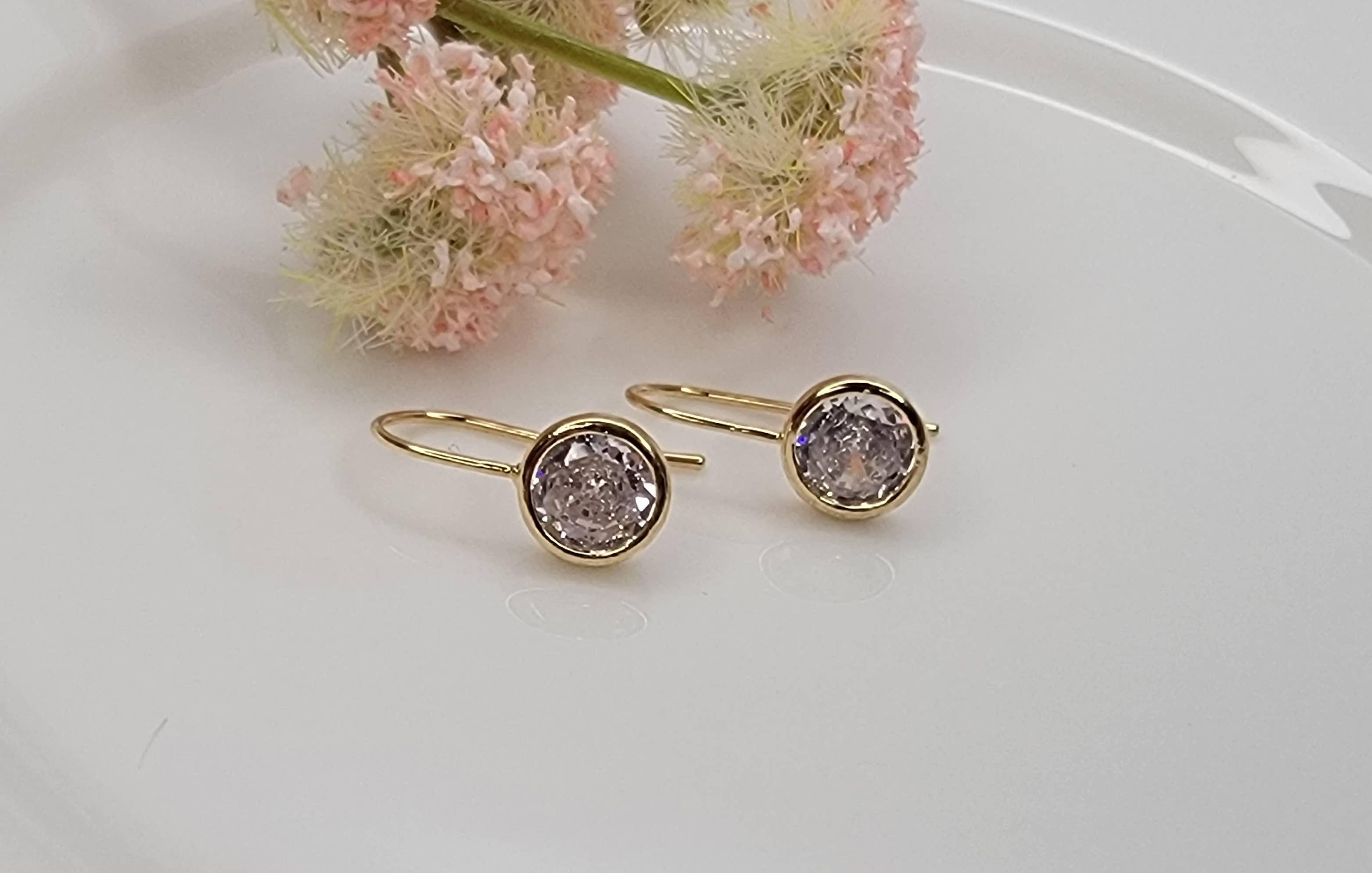 CZ EARRINGS.: GOLD