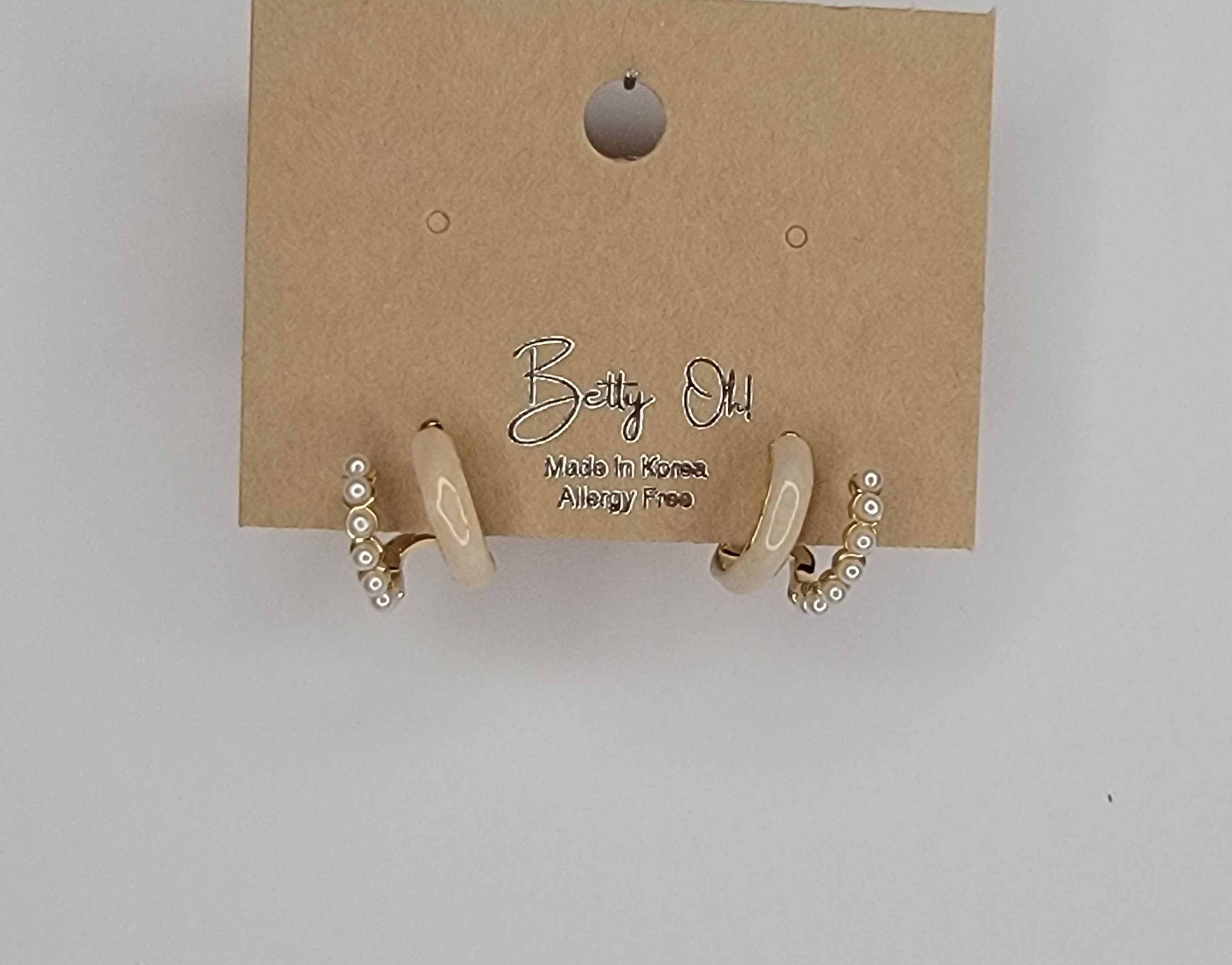 SMALL DOUBLE LAYRED HOOP EARRINGS.: IVORY