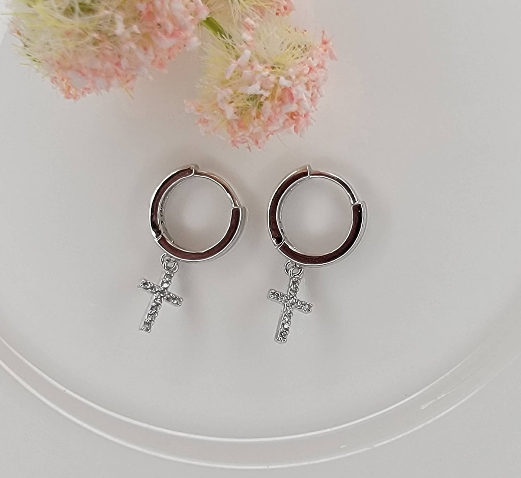 CROSS HUGGIE HOOP EARRINGS.: GOLD