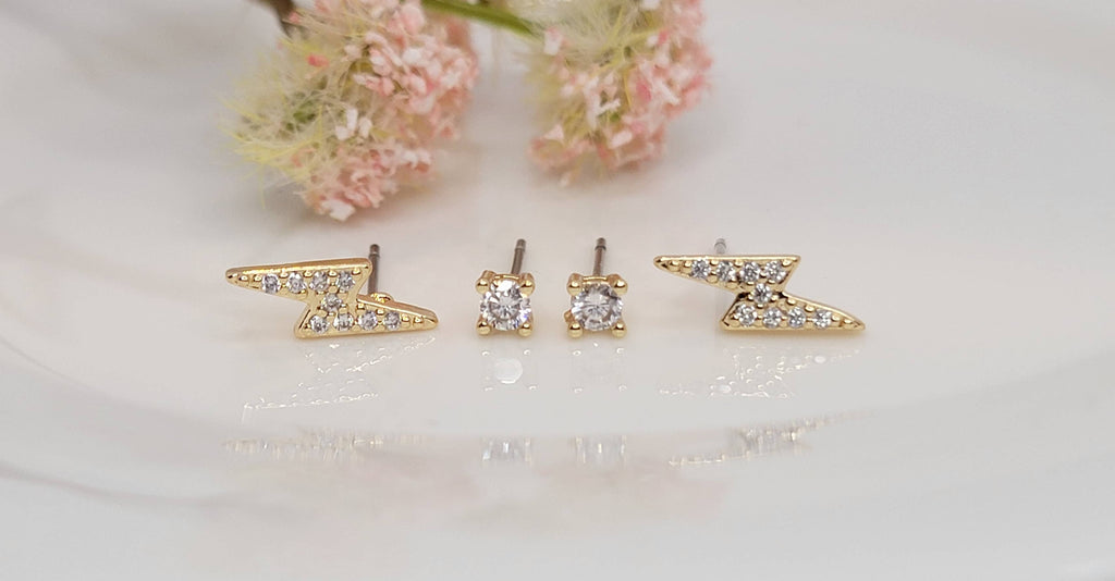 TWO PAIR SET STUD TARNISH FREE EARRINGS.